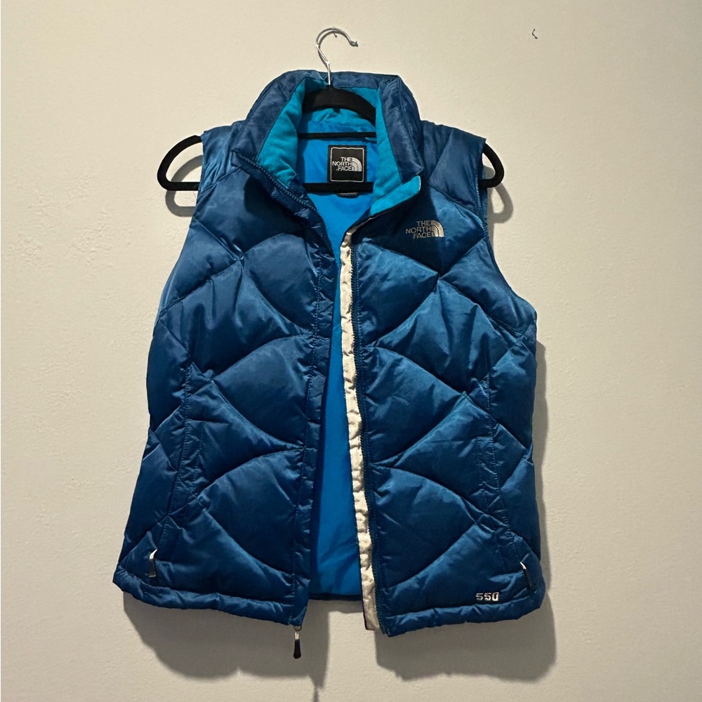 The North Face 550 quilted blue vest Medium